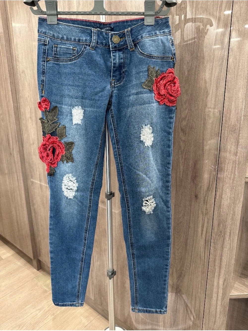 Boom Boom Jeans Women's Blue Skinny Jeans with Red Rose Appliqués